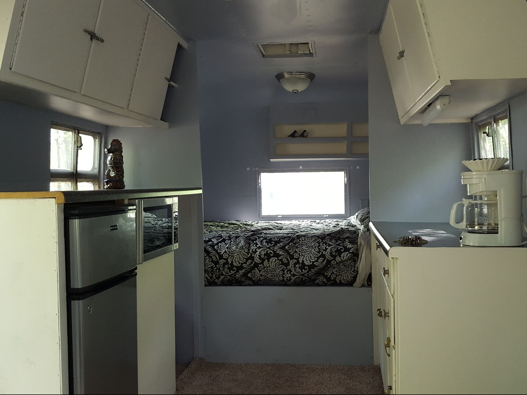 Flamingo trailer interior view from the sitting area towards the bedroom