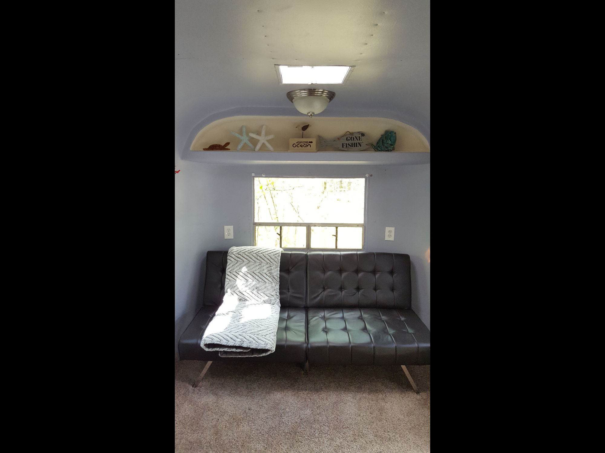 Flamingo trailer interior view of the seating area