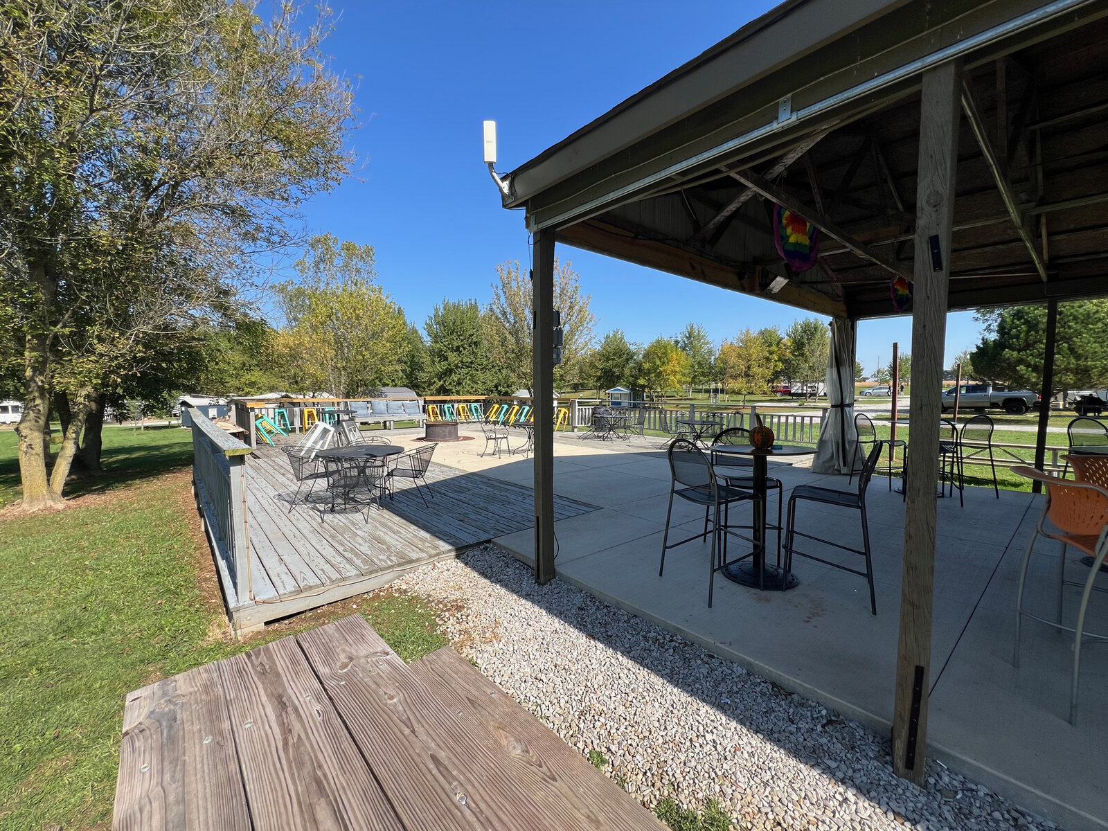 Covered patio and deck with the fire pit
